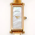 Gucci 1500L Rectangular Iridescent White Mother of Pearl dial close up