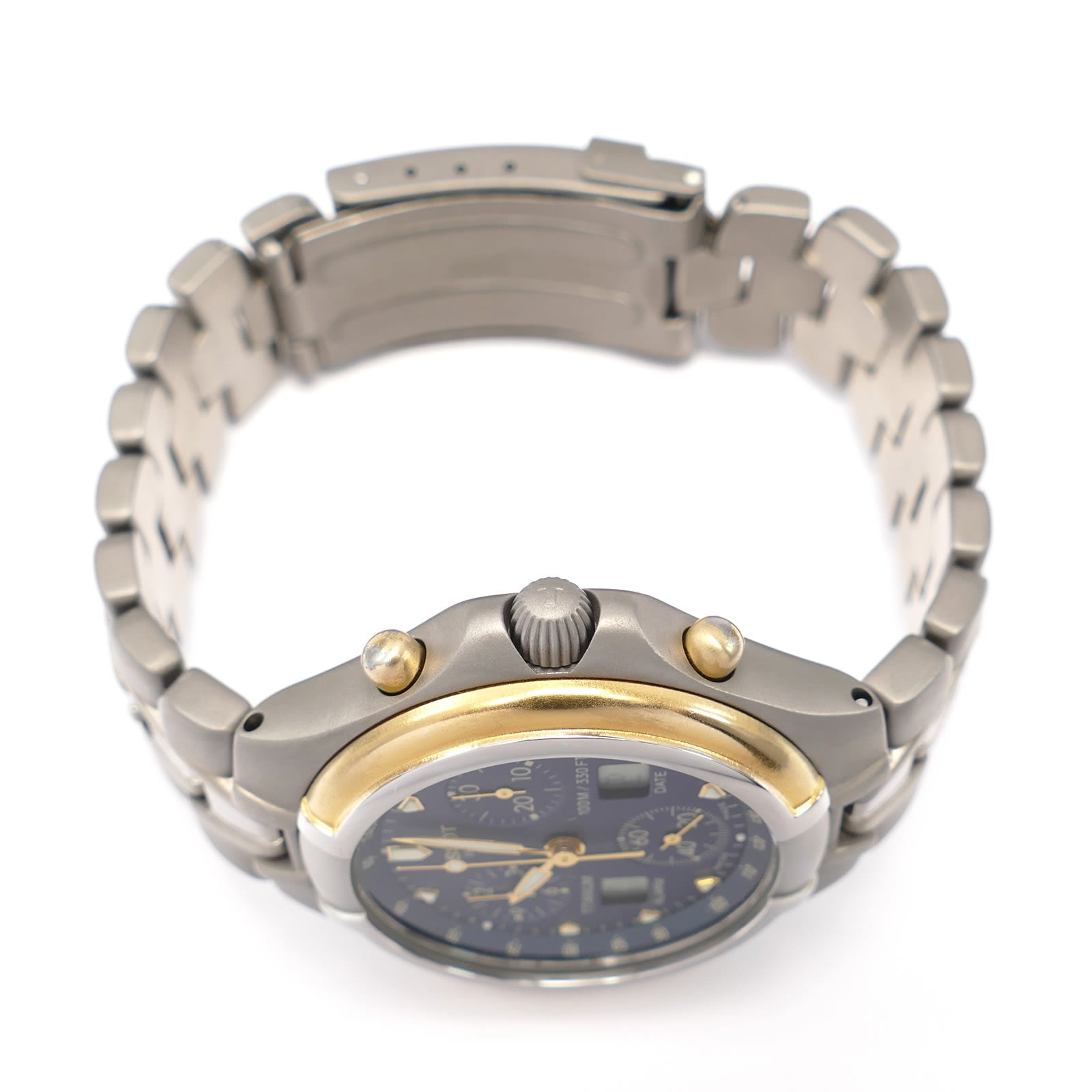 Tissot Titanium T671 screw down crown and gold plated pushers