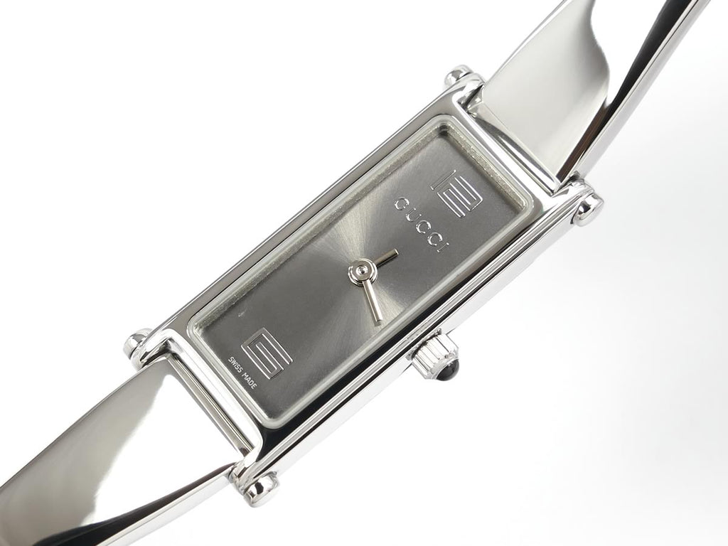 Gucci 1500 L sunburst grey dial with Arabic 12 & 7