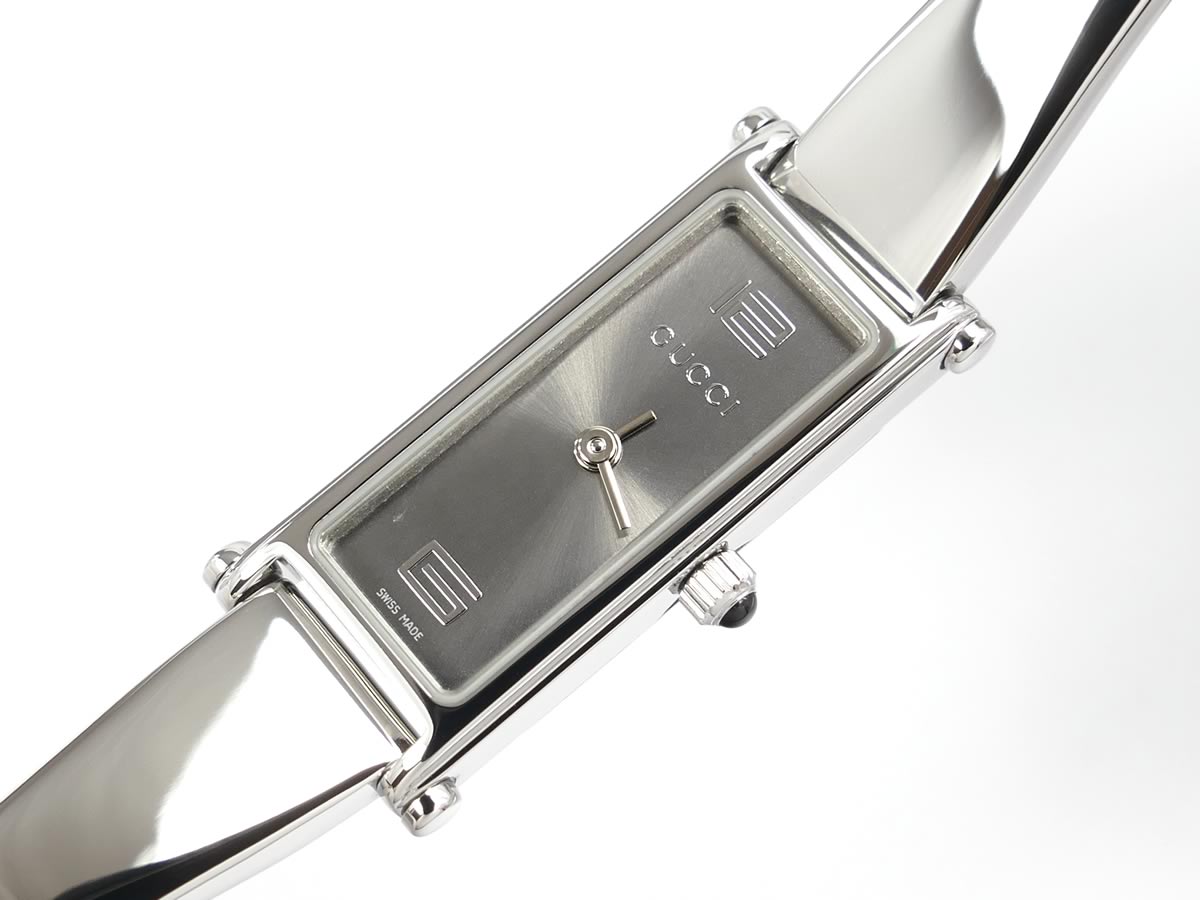 Gucci 1500 L sunburst grey dial with Arabic 12 & 7