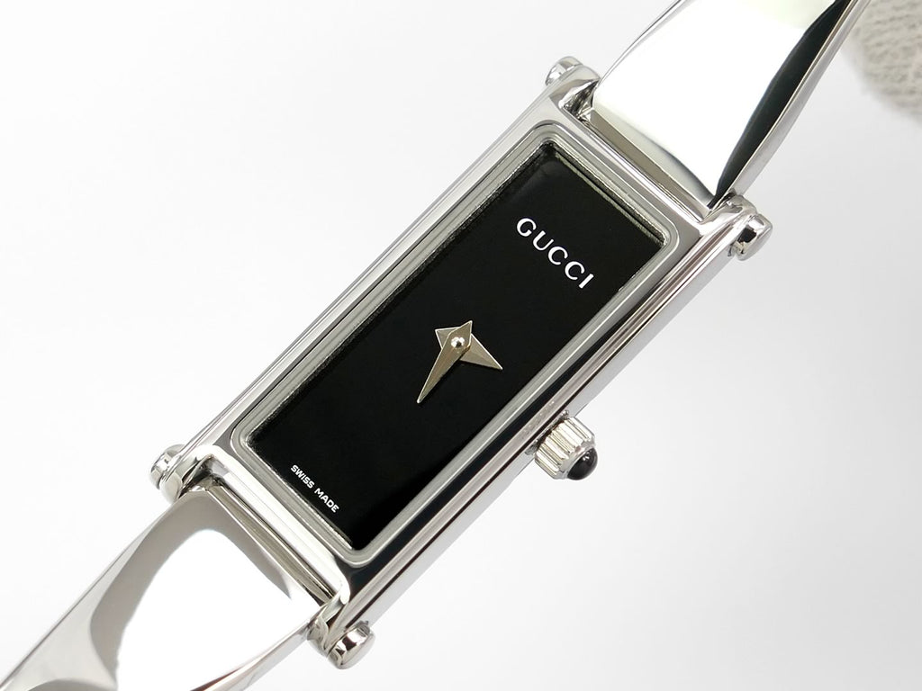 Gucci 1500 L Gloss Black Dial with Gucci and Swiss Made writing