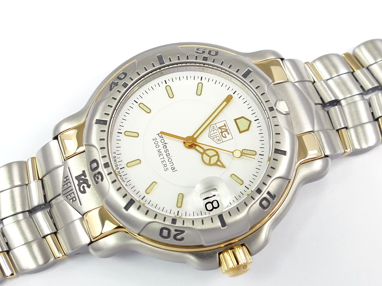 TAG Heuer 6000 White Dial WH1151 with 18k gold and date display