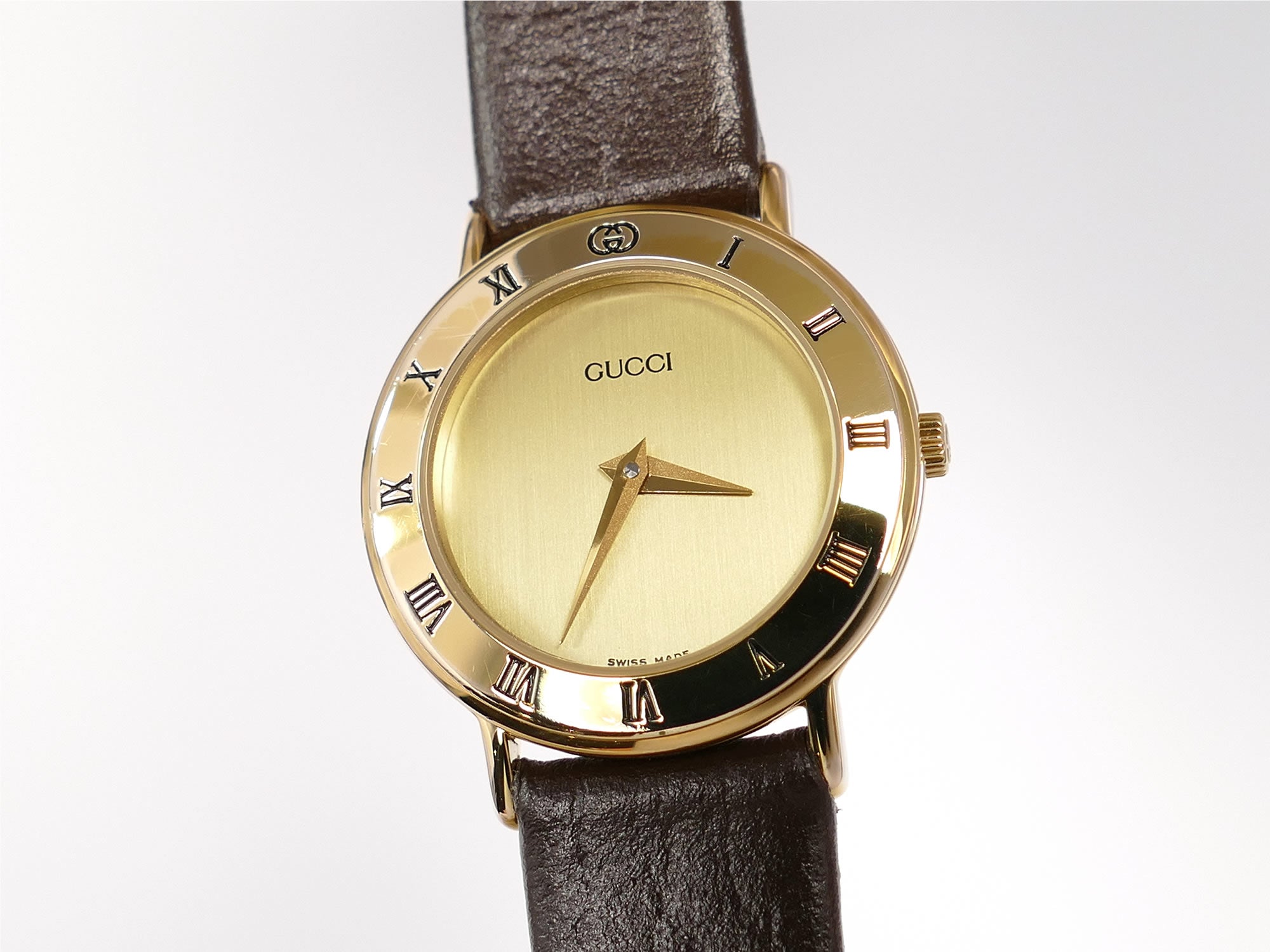 Gucci 3000L Champagne Dial Roman Numeral bezel