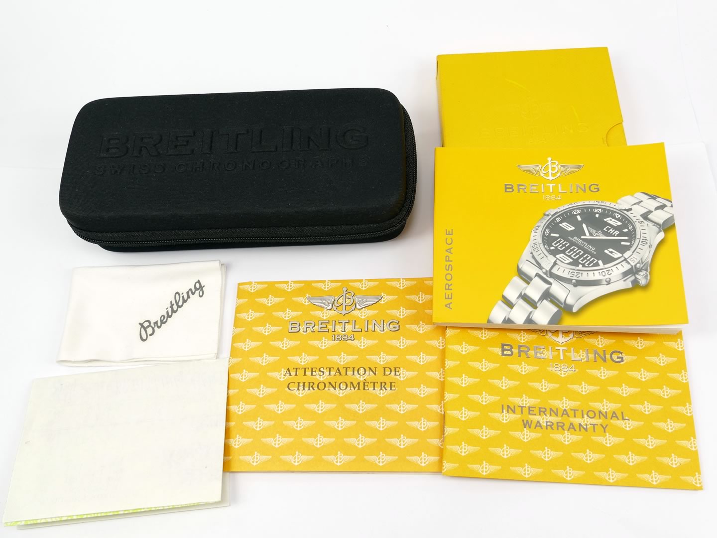 Breitling service box with papers including receipt