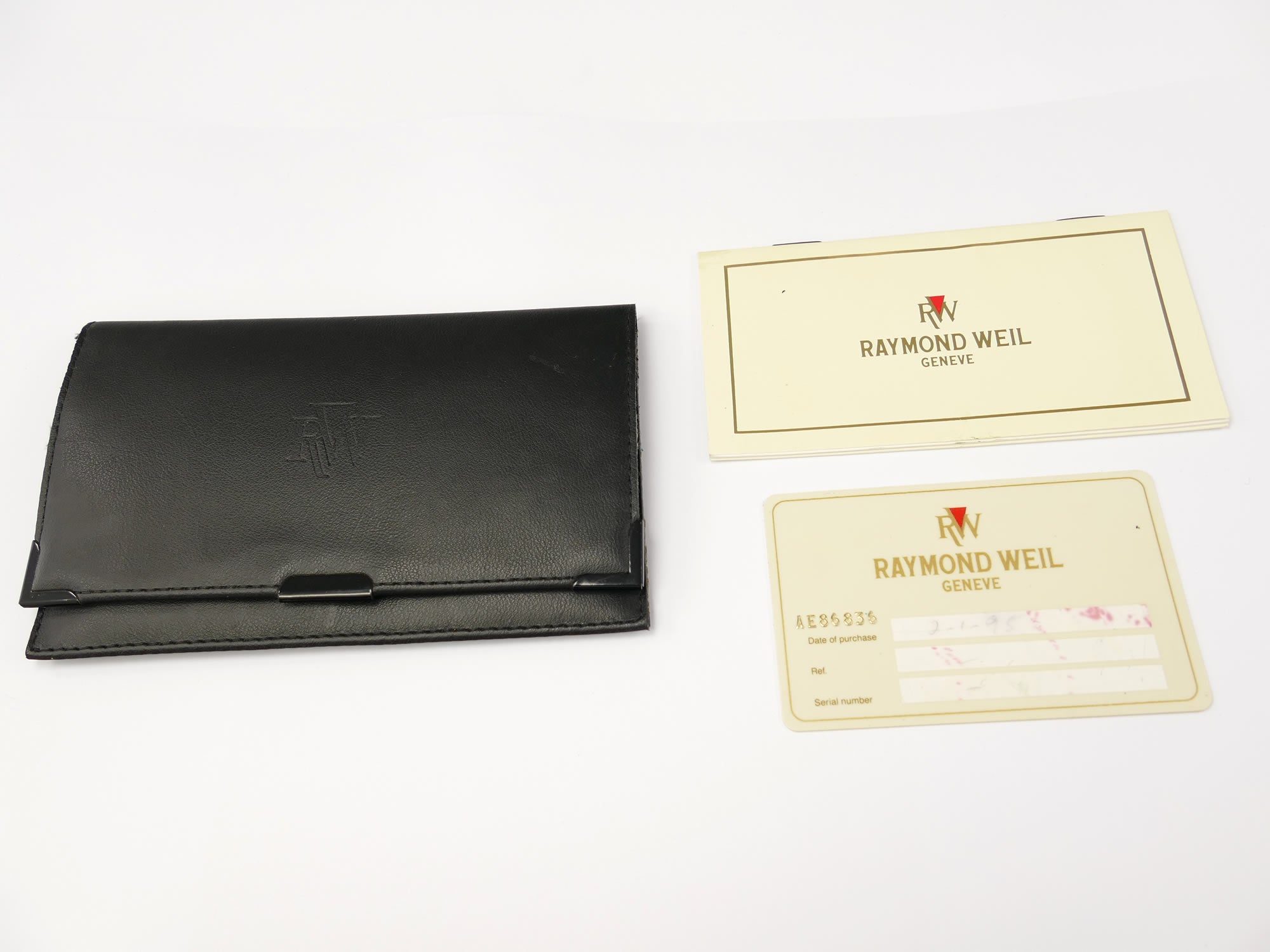 Raymond Weil Traditional 9136-2 leather wallet and papers