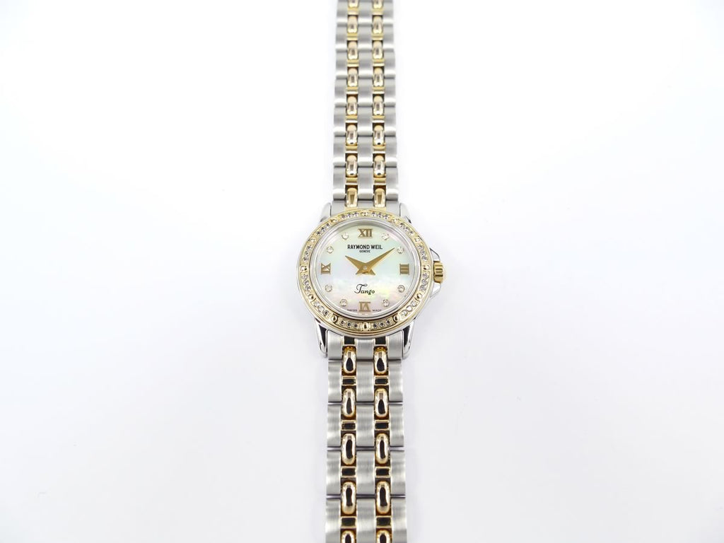 Raymond Weil Tango 5860 gold bezel set with genuine diamonds