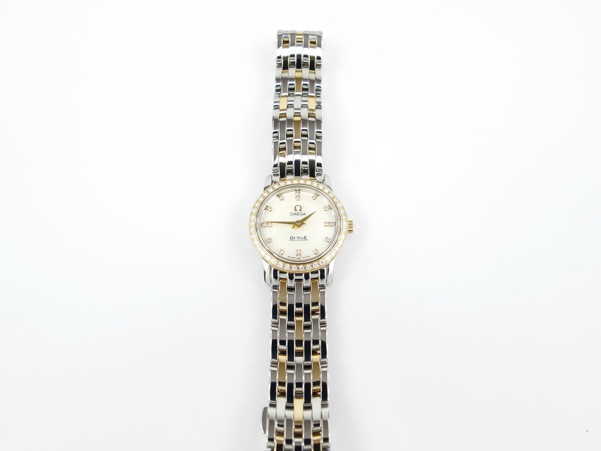 Omega De Ville Prestige White Mother of Pearl 4375.75.00 gold bezel set with 42 diamonds