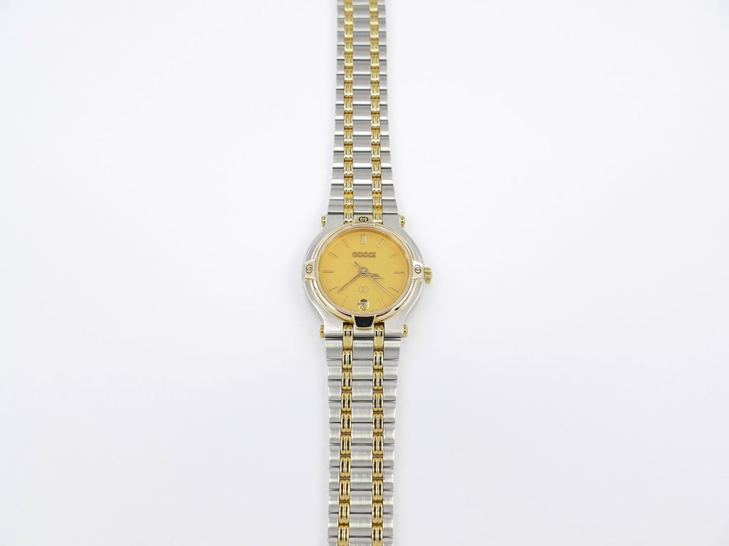 Gucci 9000L Champagne Dial with 18k Gold bezel