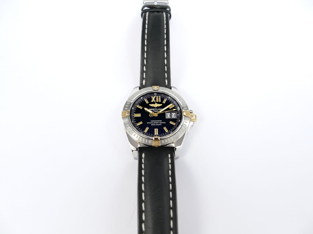 Breitling Cockpit Chronometer B49350 stainless steel rotating bezel with gold rider tabs
