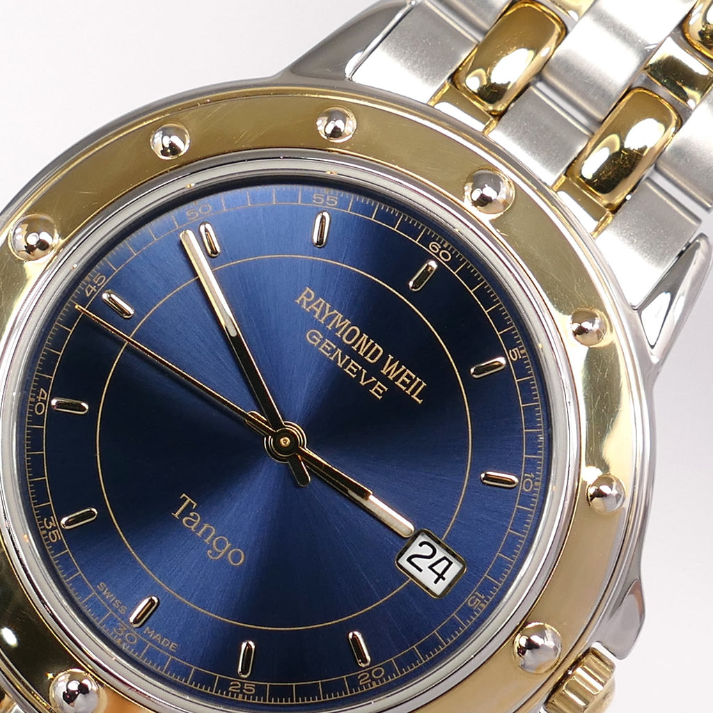 Raymond Weil Tango 5560 logo close up