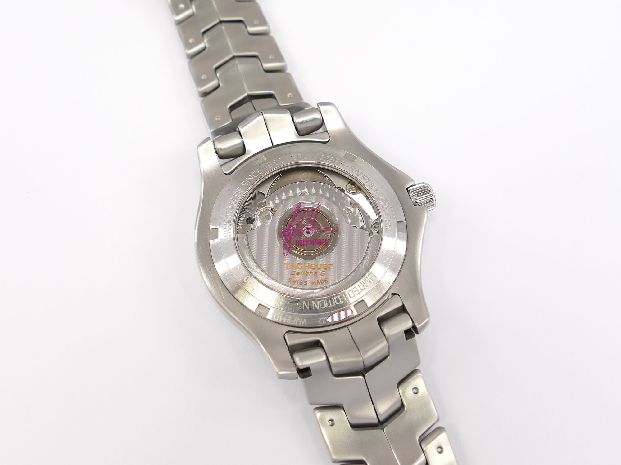 TAG Heuer Link WJF211D exhibition case back with Tiger Wood signature