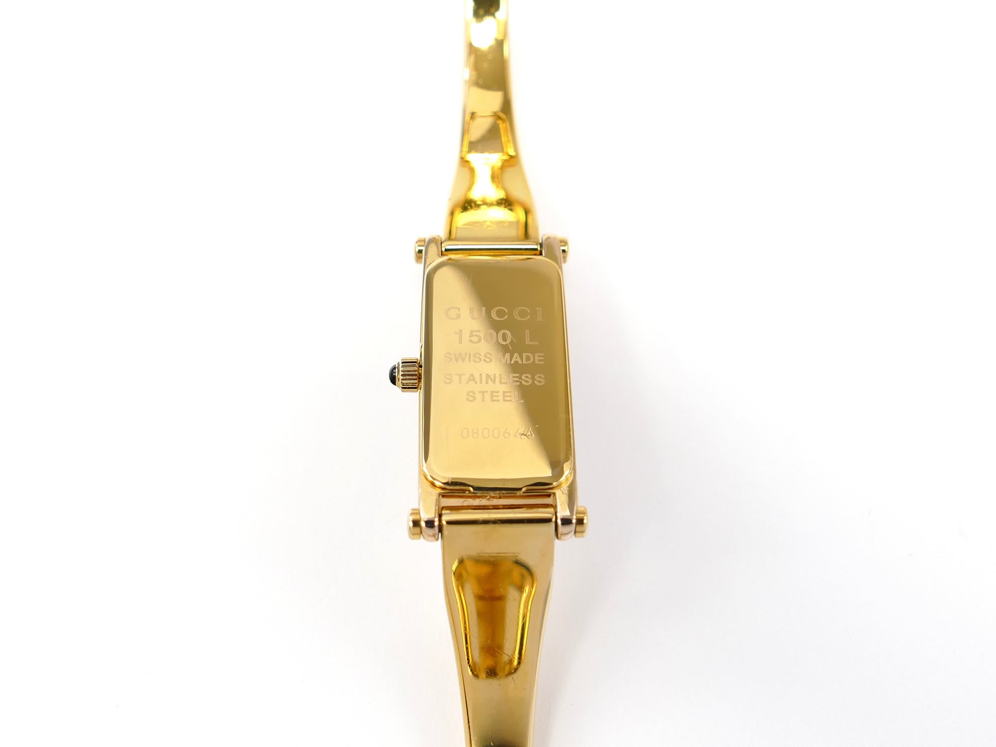 Gucci 1500L 18k Gold Plated case back