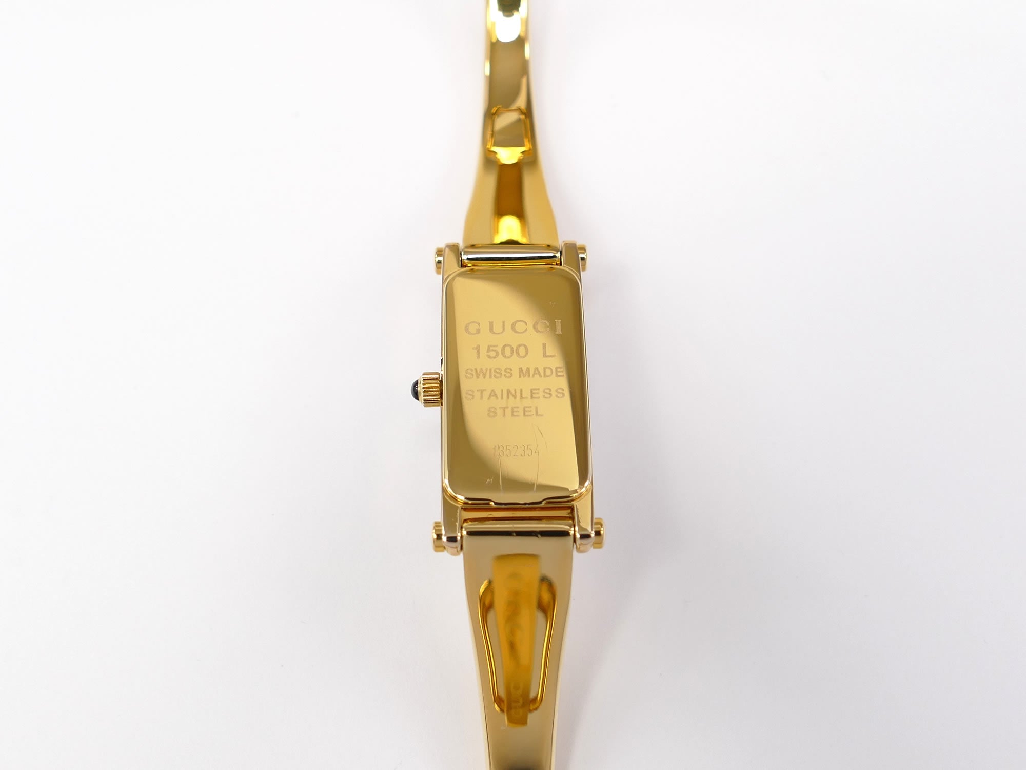 Gucci 1500L 18k Gold Plated case back