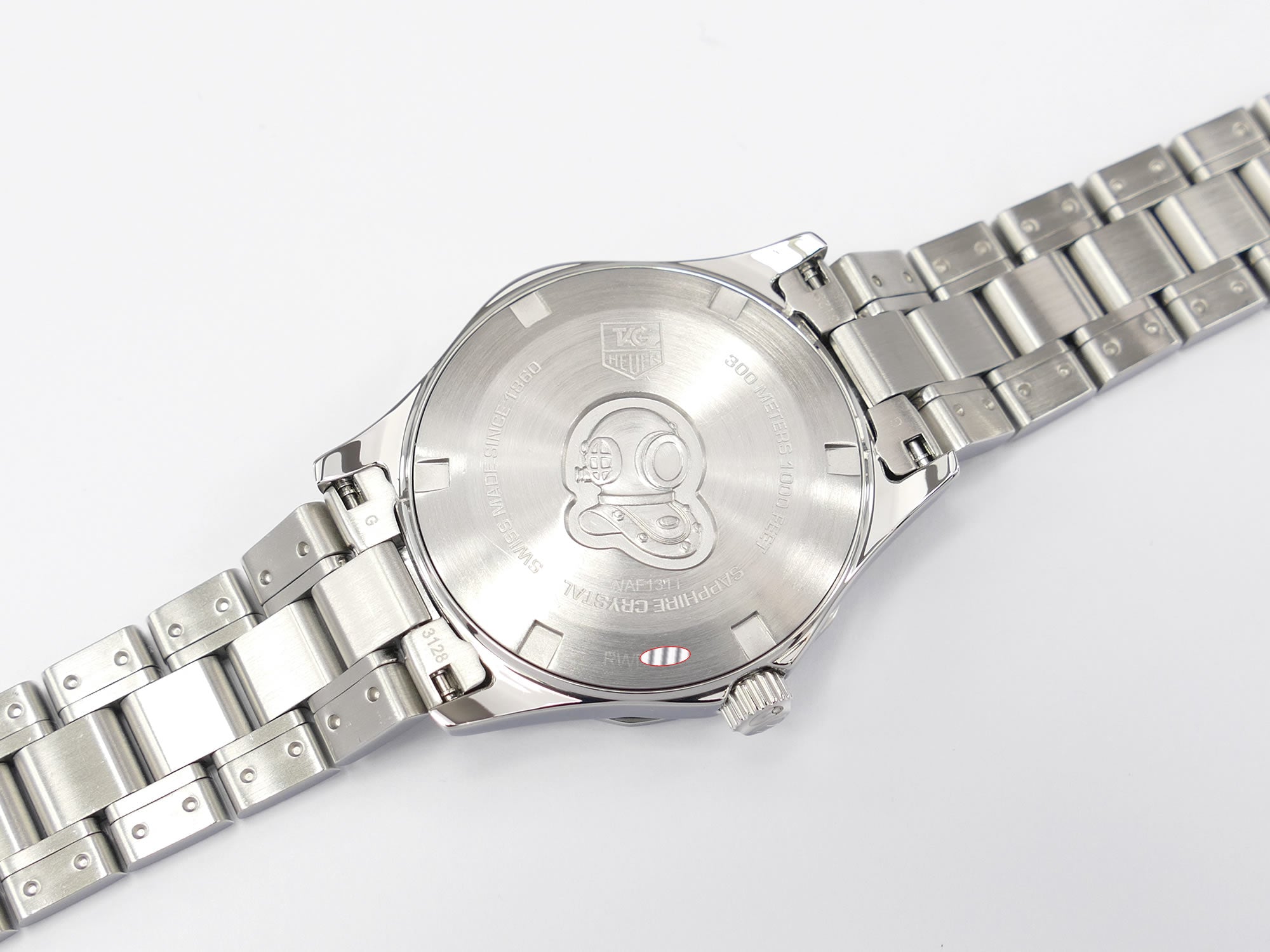 TAG Heuer Aquaracer WAF1311 stainless steel screw down case back