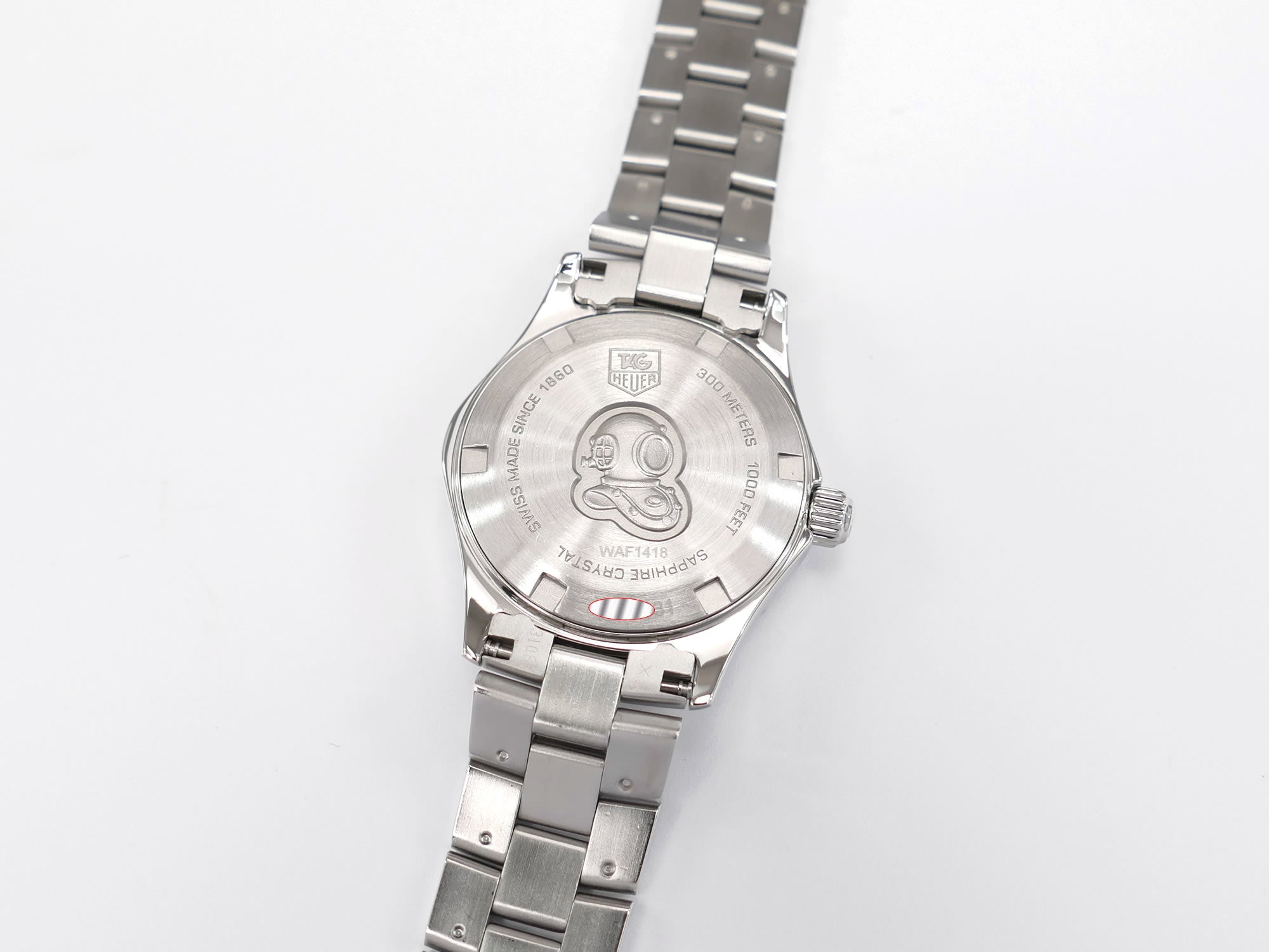 TAG Heuer Aquaracer WAF1418 stainless steel screw down case back
