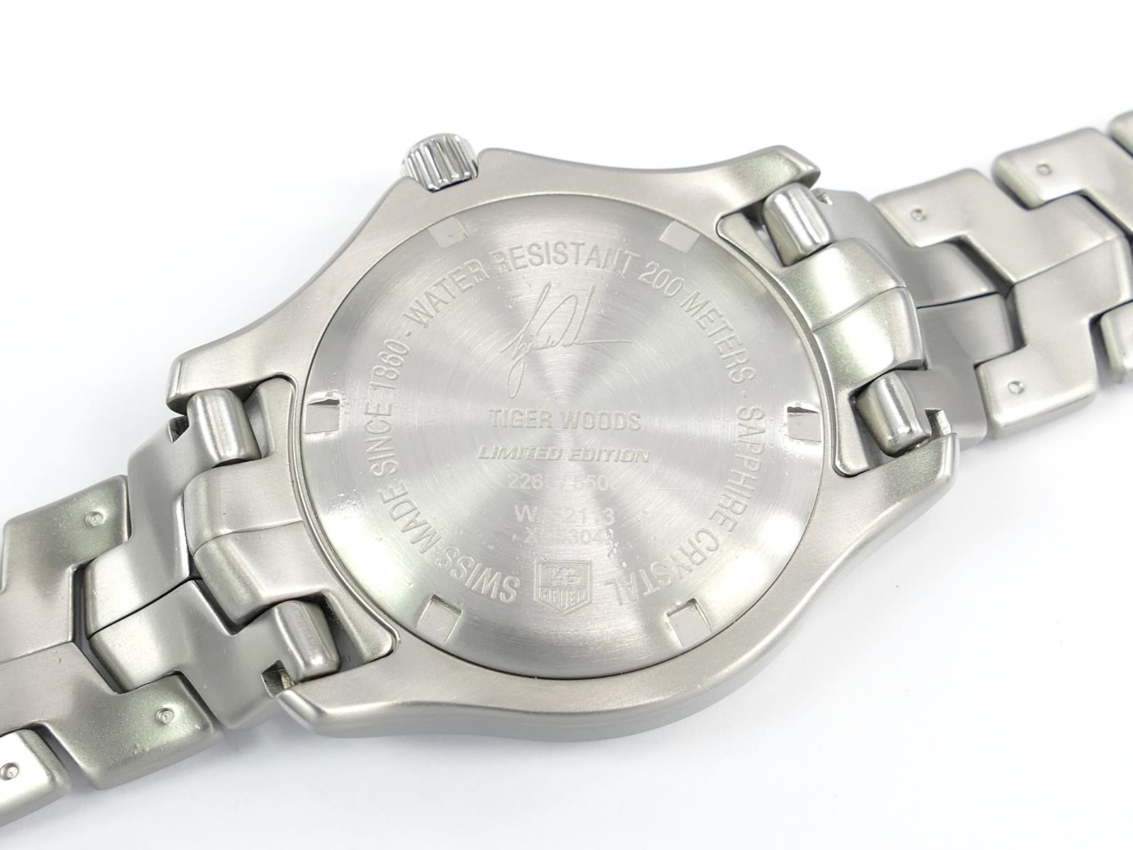 TAG Heuer Link WJF2113.BA0570 screw down case back with Tiger Woods signature