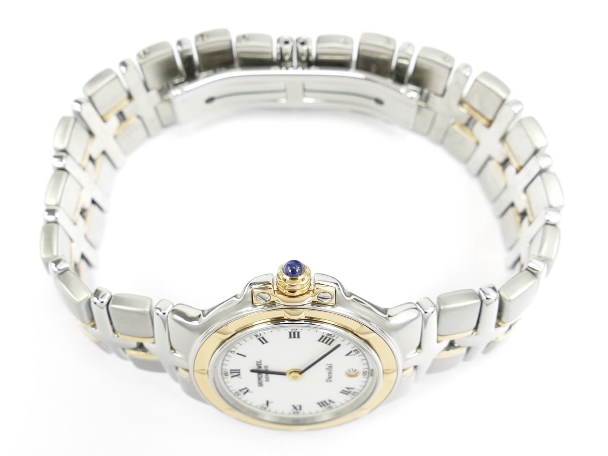 Raymond Weil Parsifal 9990 gold plated crown with blue cabochon