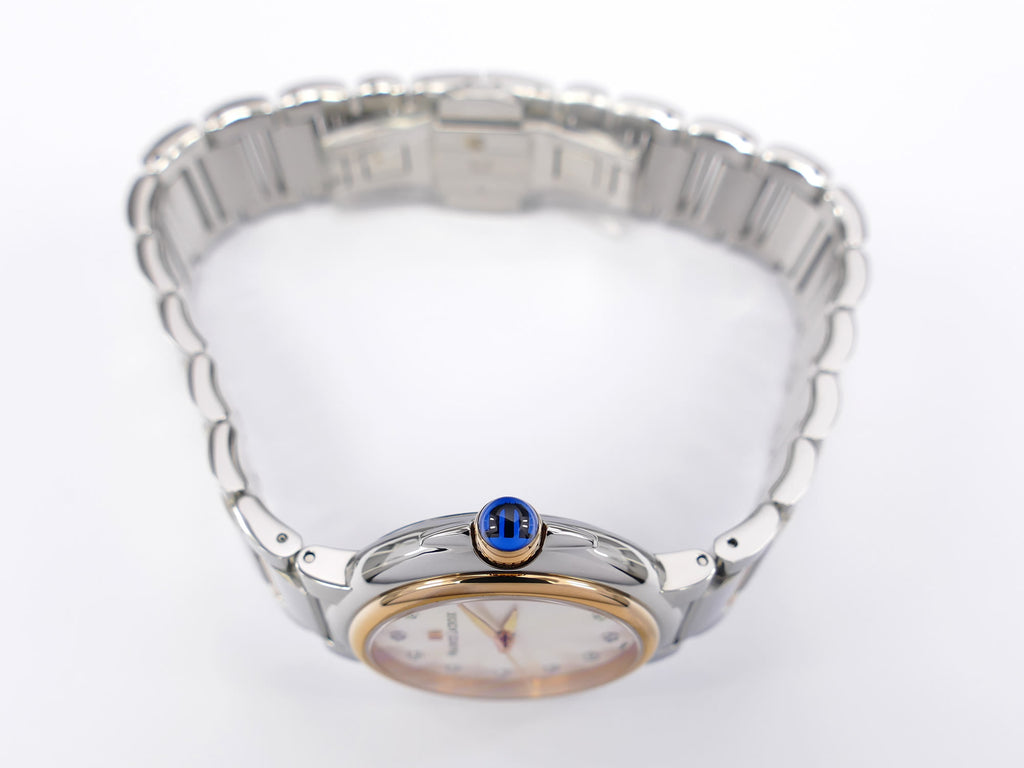 Maurice Lacroix Fiaba FA1004 rose gold PVD crown with blue cabochon