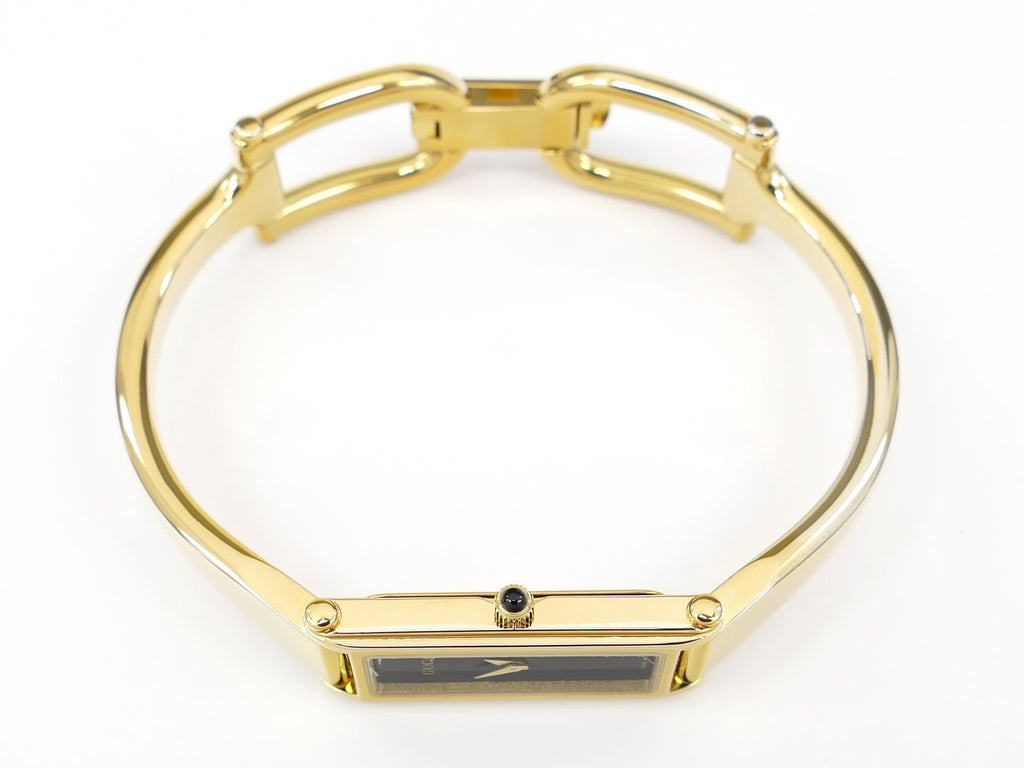 Gucci 1500 L Black Dial 18k Gold Plated crown with black cabochon