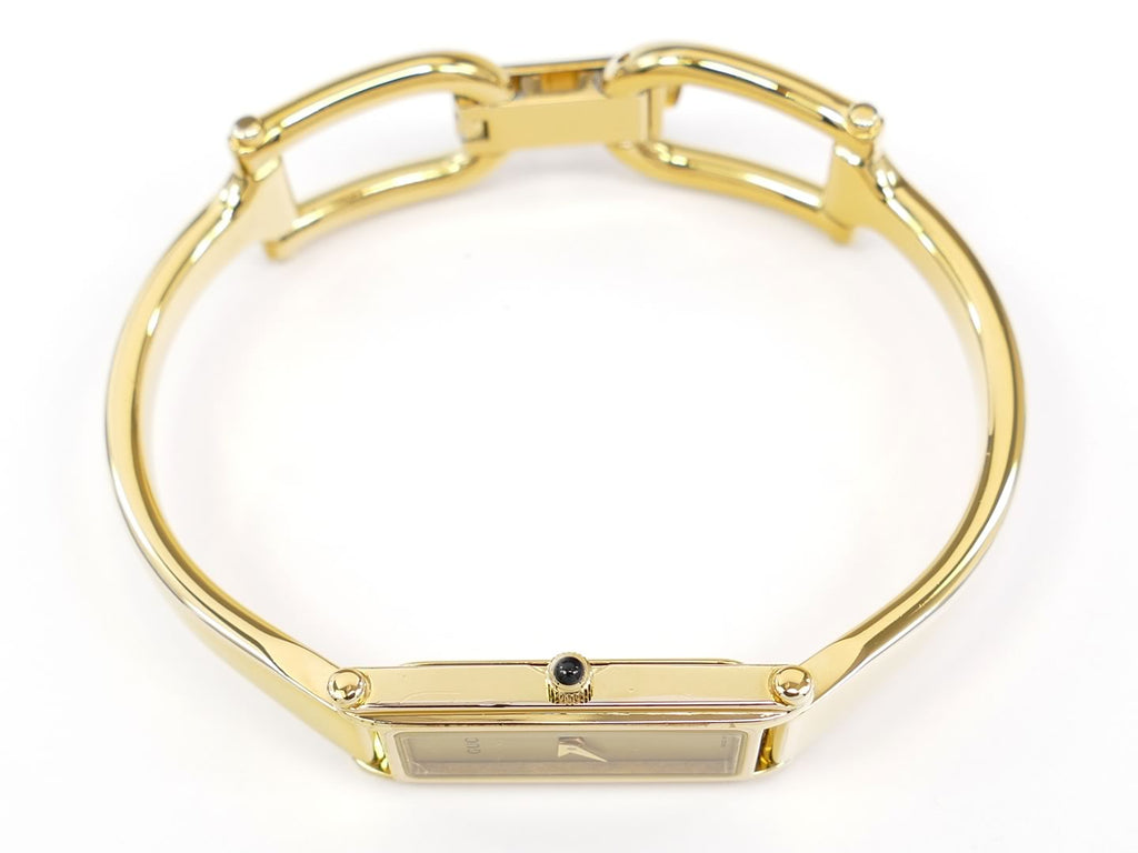 Gucci 1500L crown with black cabochon