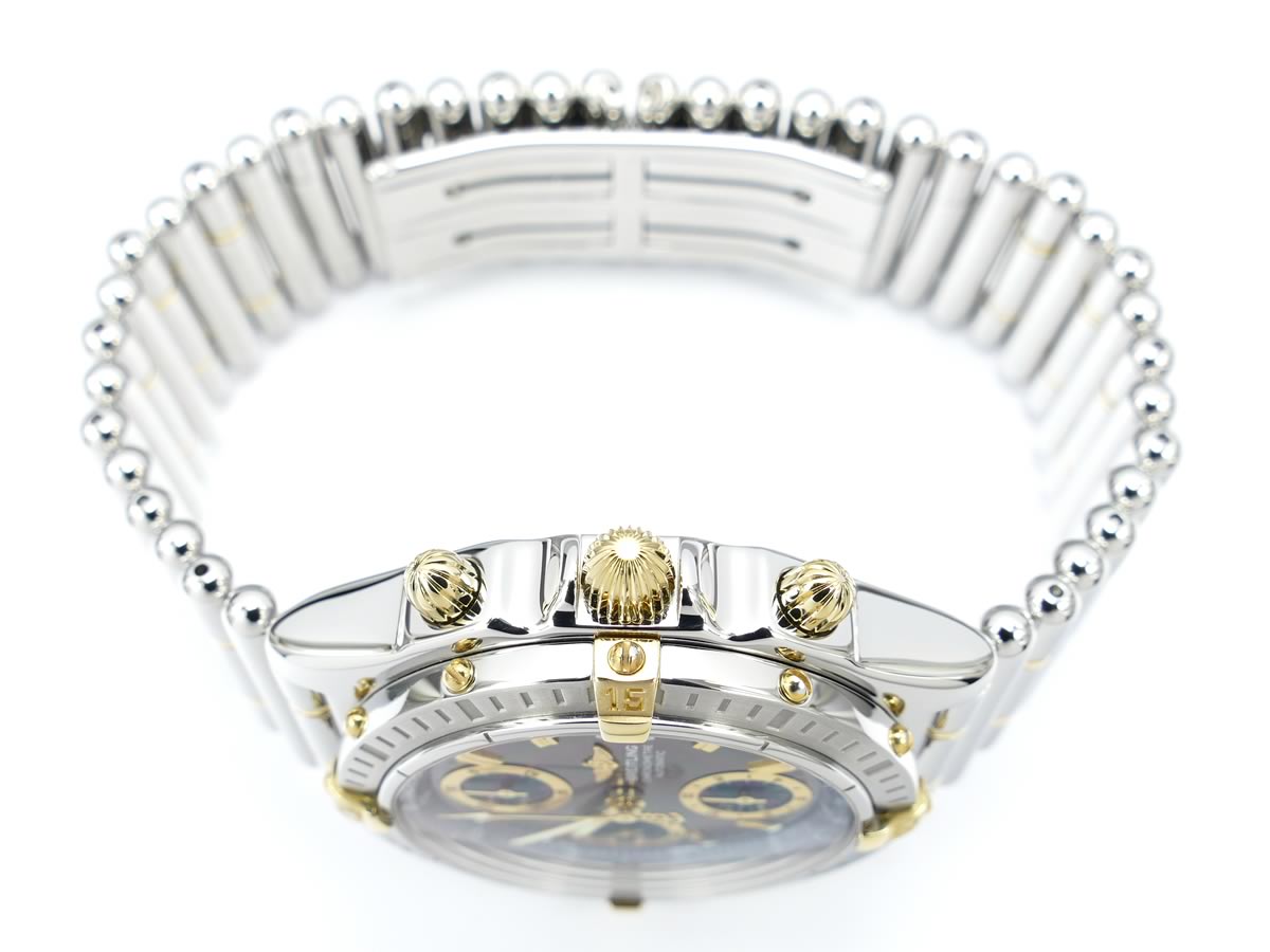 Breitling Chronomat B13352 18k Gold Plated pushers and screw-down crown
